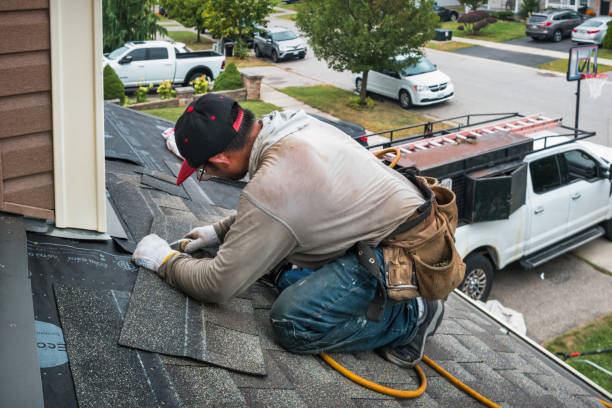 Professional Roofing technician working in Plum, PA